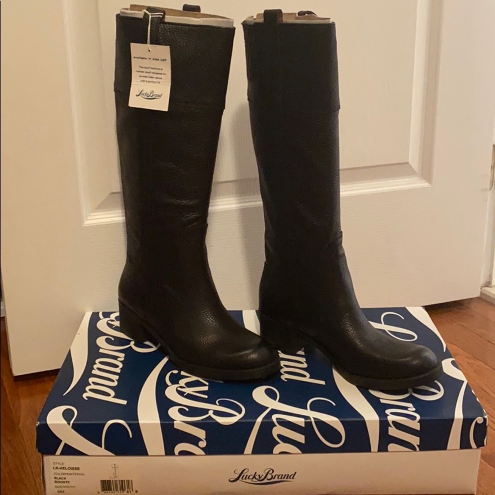 Brand new in box knee high pull on boots.
